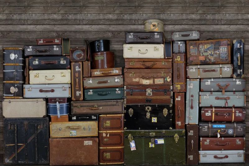 Fototapeta Stacked Suitcases Rebel Walls (4)