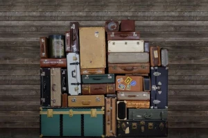 Fototapeta Stacked Suitcases Heap Rebel Walls R14062