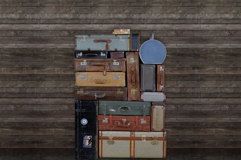 Fototapeta Stacked Suitcases Pile Rebel Walls (1)