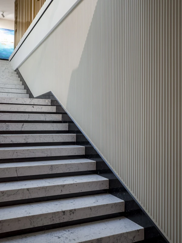 Orac-W109-fluted-wall-panels-on-staircase.webp